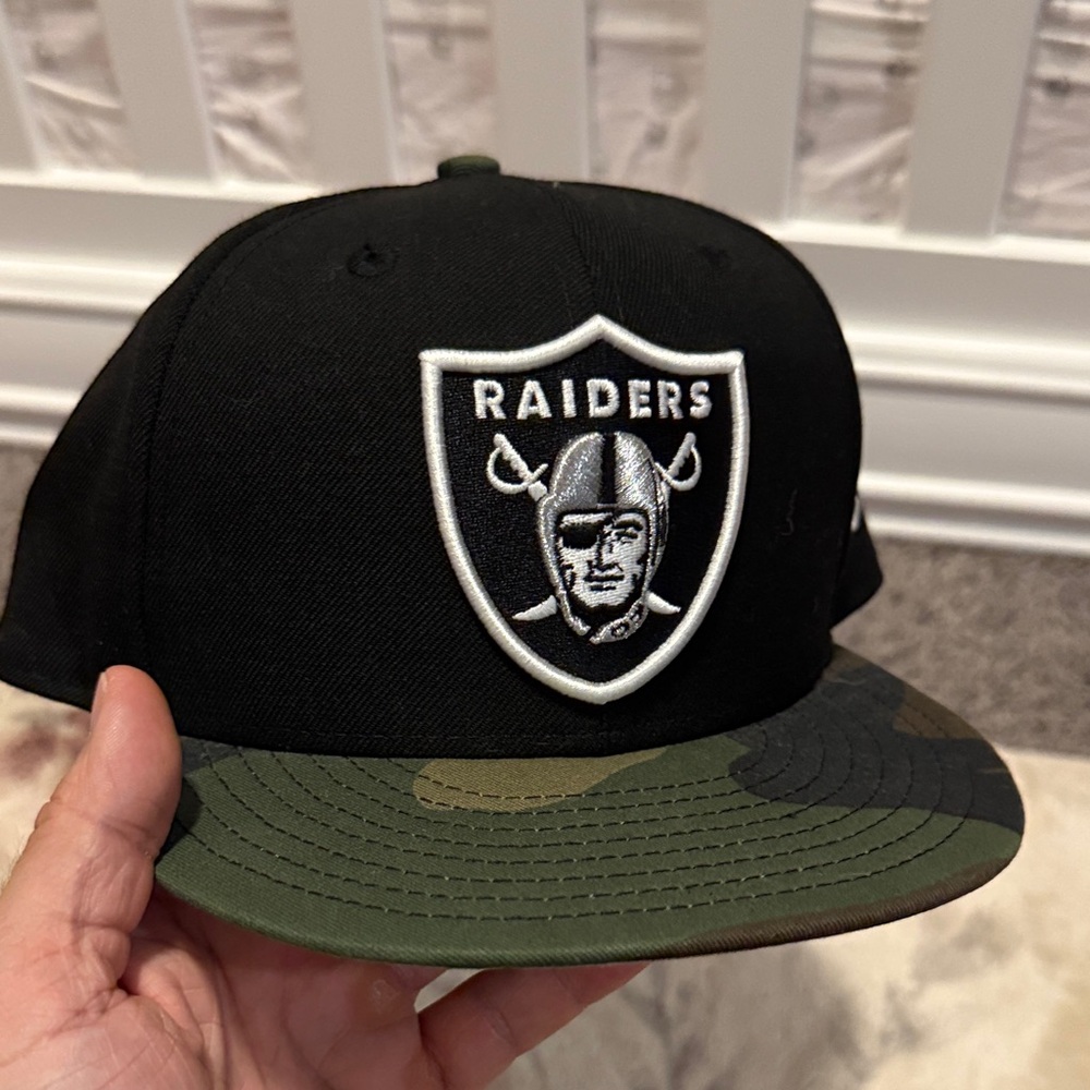 Oakland Raiders Black Snapback Hat with Camo Brim